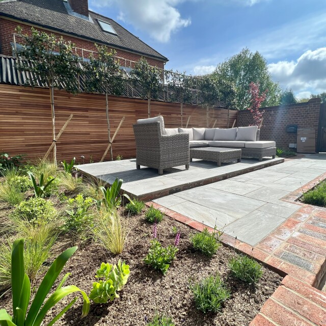 Garden seating area and paved path